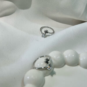 stunning silver-plated floral design and studded shimmering white diamond Adjustable finger ring for women and girls.