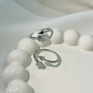 Aro stunning silver-plated floral design and studded shimmering white diamond Adjustable finger ring for women and girls.