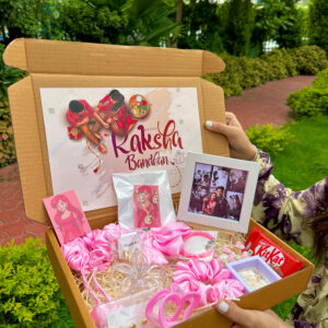 Premium Pink Color Rakhi Hampper Of Clature with Frame , Bow , Photo fram total 13 product